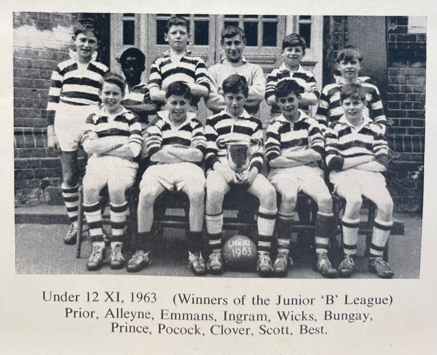 Photograph of in football kit sat and stood in two rows from the 12 Alfred Sutton Secondary School football team, 1963 ref. D/EX2938/1/2