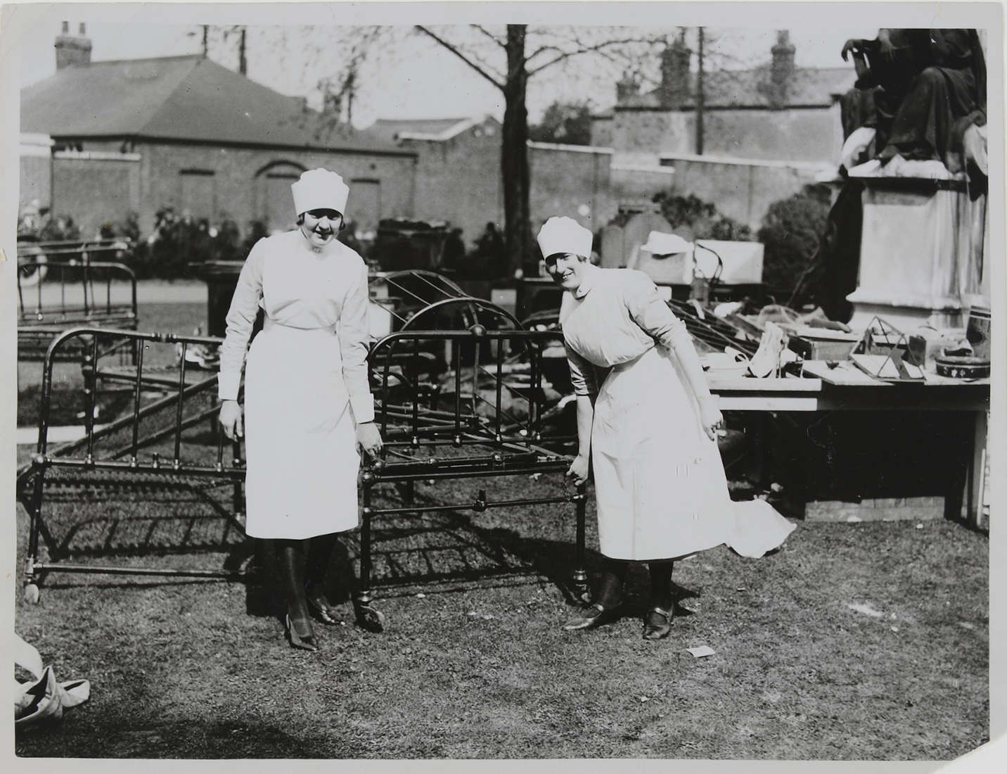 Nurses stand next to beds outside 1928 ref. D/H6/22/11/8