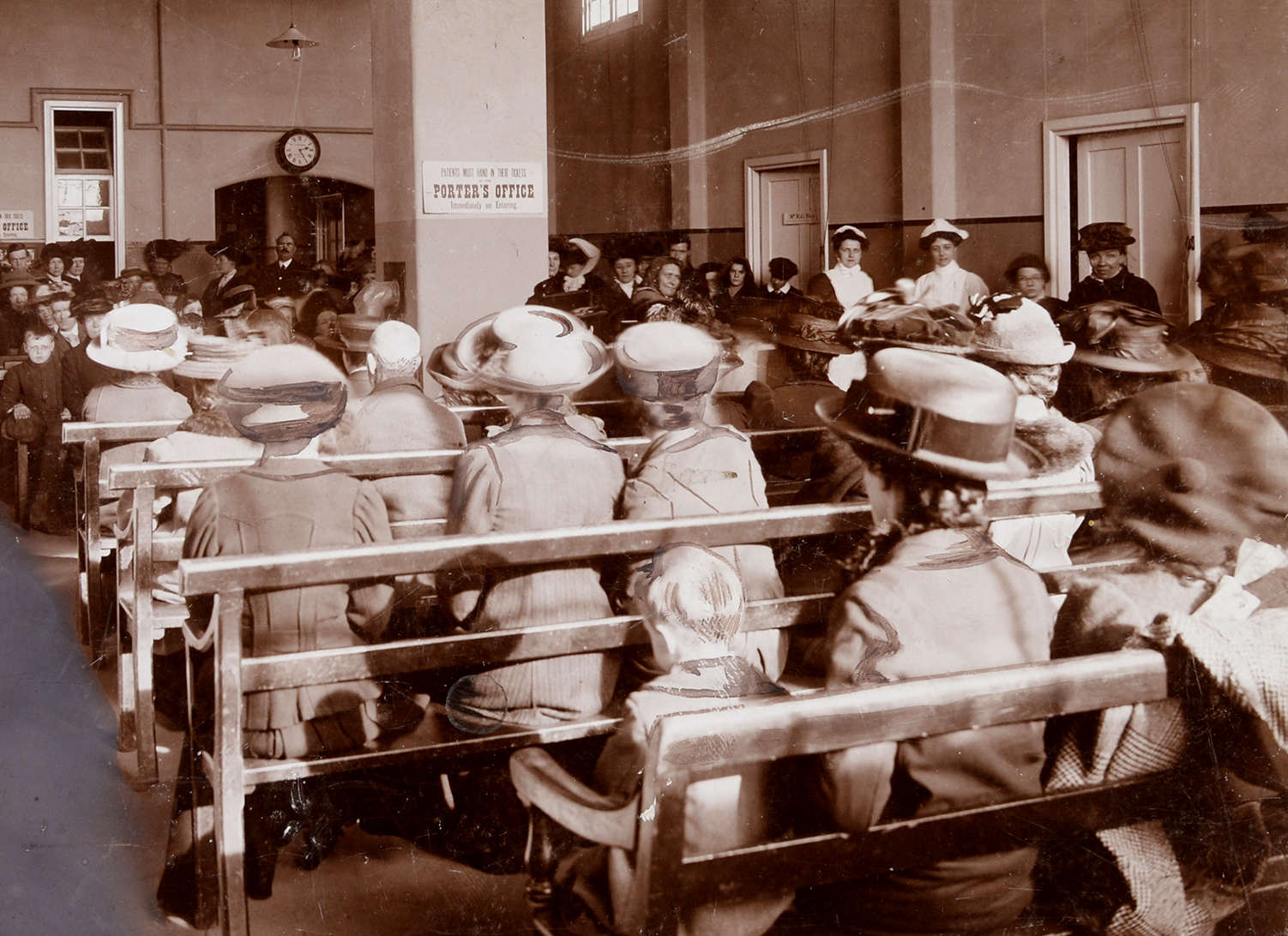 People sit in a waiting room early 1900s ref. D/H6/22/13/1