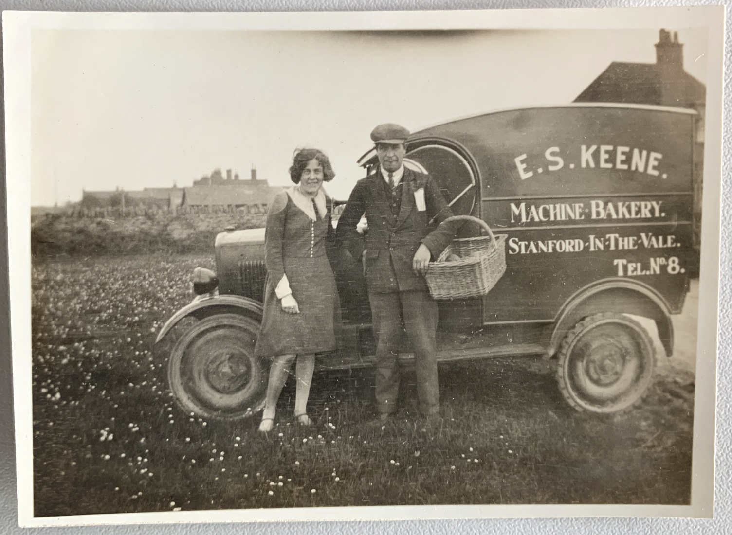 Two people stand next to a Bakery van 1930 ref. D/EX2833